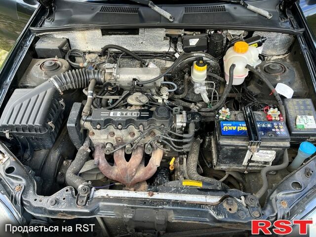 Деу Ланос 2008 у Вышгороде на Automoto.ua Чорний Деу Ланос, об'ємом двигуна 1.5 л та пробігом 210 тис. км за 1900 $, фото 8 на Automoto.ua