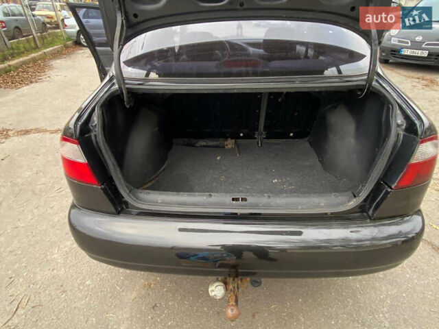 Черный Дэу Ланос, объемом двигателя 1.5 л и пробегом 231 тыс. км за 2900 $, фото 13 на Automoto.ua