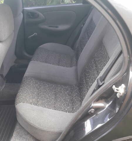 Черный Дэу Ланос, объемом двигателя 1.4 л и пробегом 175 тыс. км за 2500 $, фото 10 на Automoto.ua