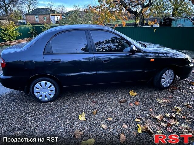 Черный Дэу Ланос, объемом двигателя 1.4 л и пробегом 220 тыс. км за 1800 $, фото 6 на Automoto.ua