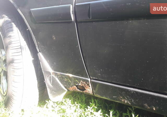 Черный Дэу Ланос, объемом двигателя 1.4 л и пробегом 175 тыс. км за 2500 $, фото 5 на Automoto.ua