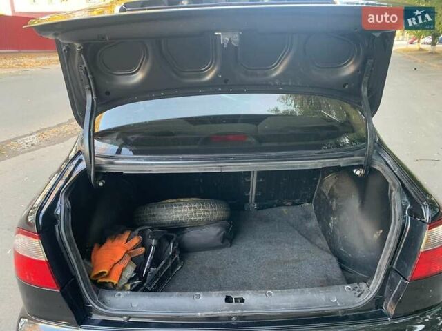 Чорний Деу Ланос, об'ємом двигуна 1.5 л та пробігом 245 тис. км за 3100 $, фото 17 на Automoto.ua