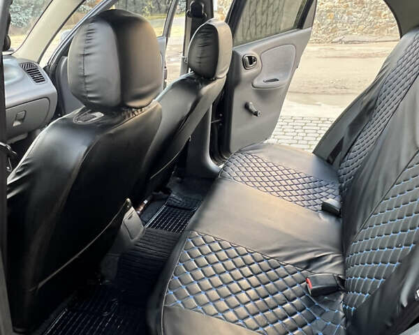 Черный Дэу Ланос, объемом двигателя 1.5 л и пробегом 156 тыс. км за 3200 $, фото 22 на Automoto.ua