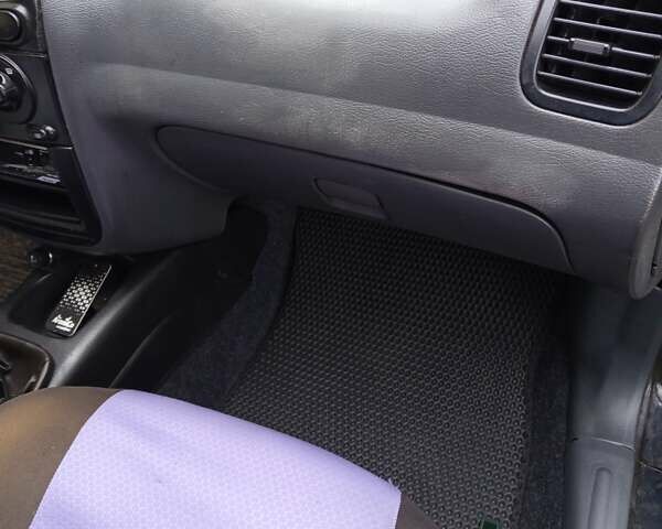 Черный Дэу Ланос, объемом двигателя 1.5 л и пробегом 180 тыс. км за 2300 $, фото 10 на Automoto.ua