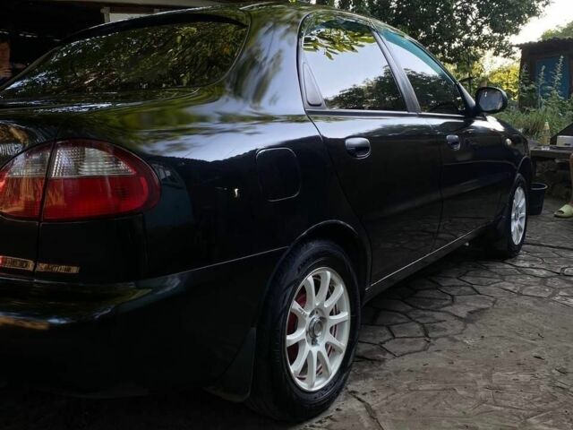 Черный Дэу Ланос, объемом двигателя 1.5 л и пробегом 1000 тыс. км за 2600 $, фото 4 на Automoto.ua