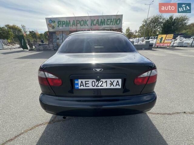 Чорний Деу Ланос, об'ємом двигуна 1.6 л та пробігом 137 тис. км за 3900 $, фото 6 на Automoto.ua