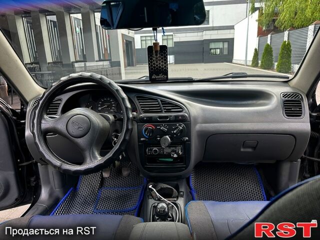 Черный Дэу Ланос, объемом двигателя 1.6 л и пробегом 120 тыс. км за 3000 $, фото 5 на Automoto.ua