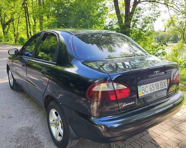 Черный Дэу Ланос, объемом двигателя 1.4 л и пробегом 165 тыс. км за 1450 $, фото 4 на Automoto.ua