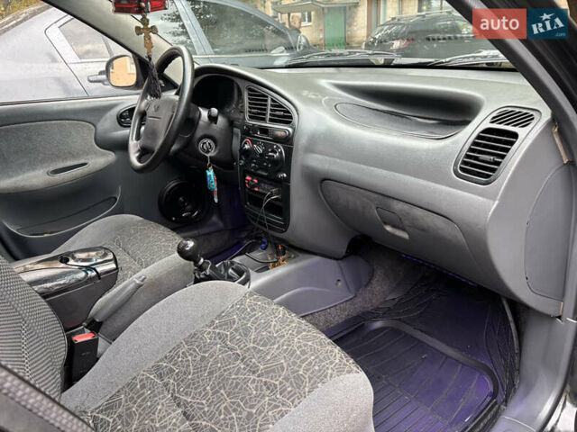 Черный Дэу Ланос, объемом двигателя 1.6 л и пробегом 270 тыс. км за 2900 $, фото 23 на Automoto.ua