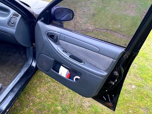 Чорний Деу Ланос, об'ємом двигуна 1.5 л та пробігом 256 тис. км за 1100 $, фото 11 на Automoto.ua