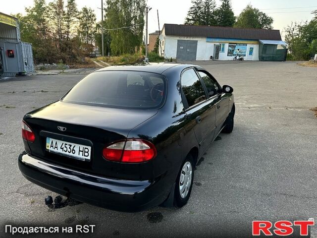 Черный Дэу Ланос, объемом двигателя 1.5 л и пробегом 212 тыс. км за 1550 $, фото 3 на Automoto.ua