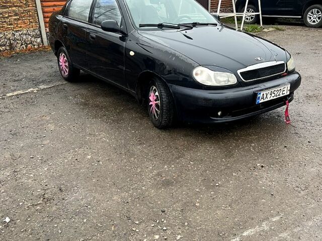 Черный Дэу Ланос, объемом двигателя 1.4 л и пробегом 202 тыс. км за 1400 $, фото 1 на Automoto.ua