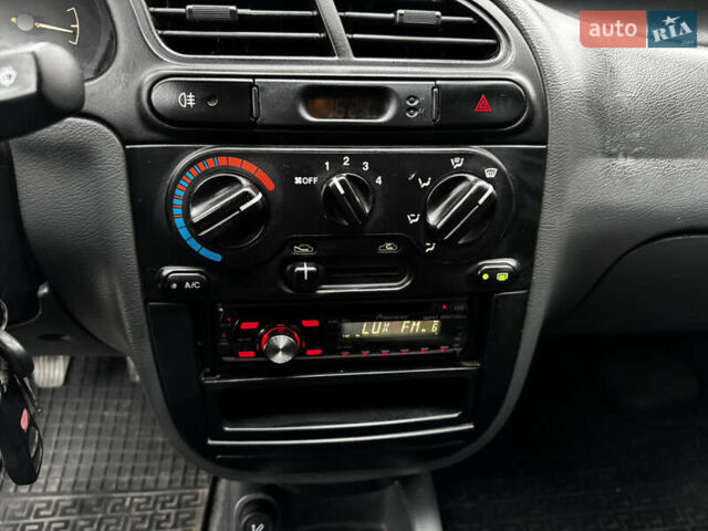 Чорний Деу Ланос, об'ємом двигуна 1.5 л та пробігом 220 тис. км за 2199 $, фото 16 на Automoto.ua