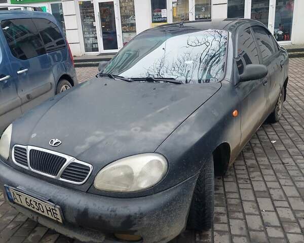 Чорний Деу Ланос, об'ємом двигуна 1.39 л та пробігом 320 тис. км за 1500 $, фото 1 на Automoto.ua