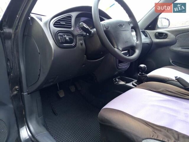 Черный Дэу Ланос, объемом двигателя 1.5 л и пробегом 180 тыс. км за 2300 $, фото 14 на Automoto.ua