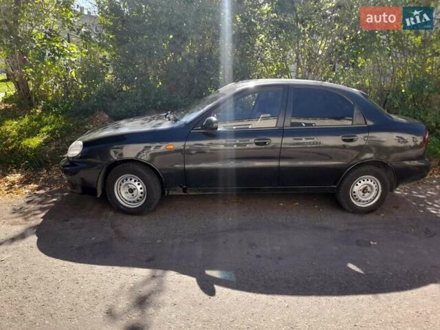 Чорний Деу Ланос, об'ємом двигуна 1.5 л та пробігом 159 тис. км за 2350 $, фото 3 на Automoto.ua