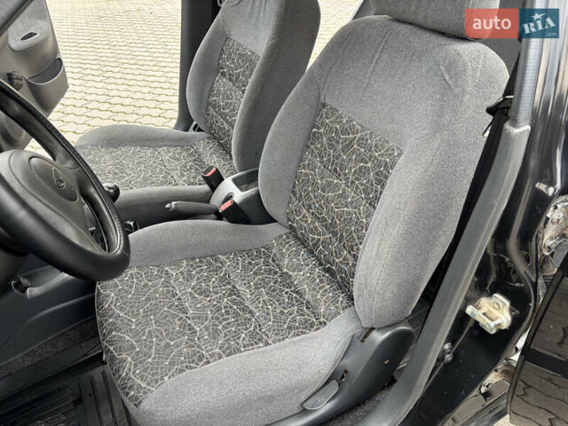 Чорний Деу Ланос, об'ємом двигуна 1.5 л та пробігом 186 тис. км за 2950 $, фото 12 на Automoto.ua