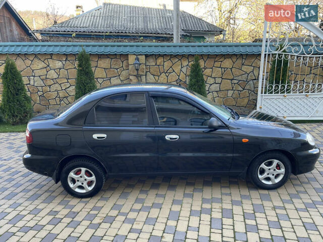 Черный Дэу Ланос, объемом двигателя 1.4 л и пробегом 233 тыс. км за 2500 $, фото 17 на Automoto.ua