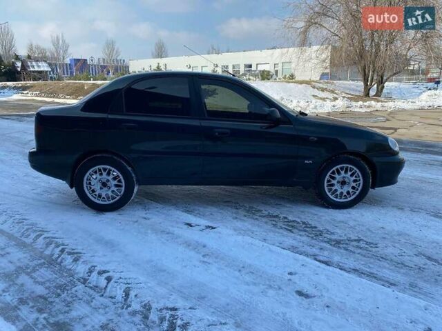 Чорний Деу Ланос, об'ємом двигуна 1.5 л та пробігом 231 тис. км за 2299 $, фото 2 на Automoto.ua