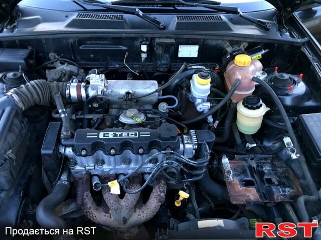 Черный Дэу Ланос, объемом двигателя 1.5 л и пробегом 368 тыс. км за 1150 $, фото 11 на Automoto.ua