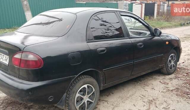 Чорний Деу Ланос, об'ємом двигуна 1.4 л та пробігом 180 тис. км за 1600 $, фото 3 на Automoto.ua