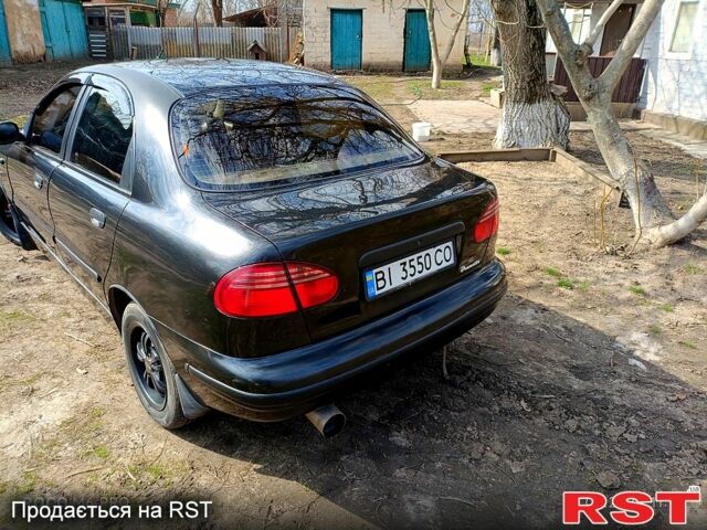 Черный Дэу Ланос, объемом двигателя 1.5 л и пробегом 280 тыс. км за 2100 $, фото 6 на Automoto.ua