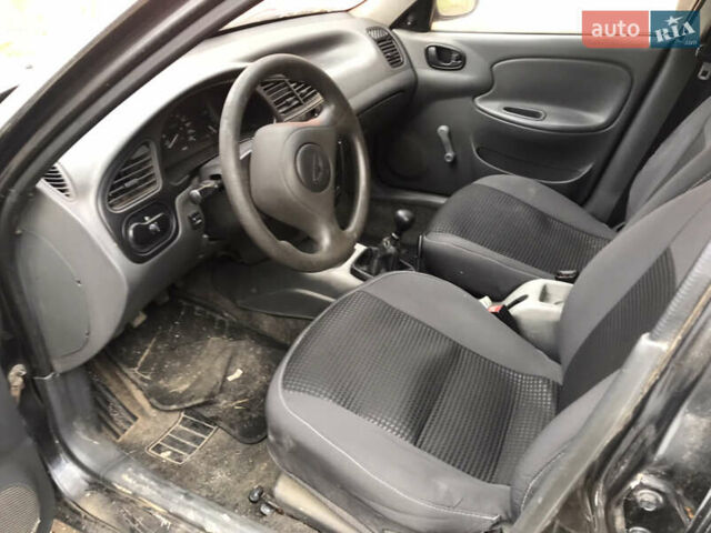 Черный Дэу Ланос, объемом двигателя 1.5 л и пробегом 150 тыс. км за 950 $, фото 8 на Automoto.ua