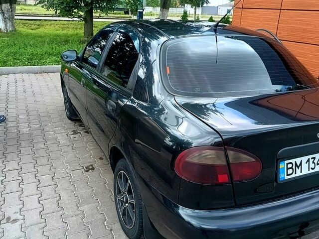 Черный Дэу Ланос, объемом двигателя 1.5 л и пробегом 173 тыс. км за 3200 $, фото 2 на Automoto.ua
