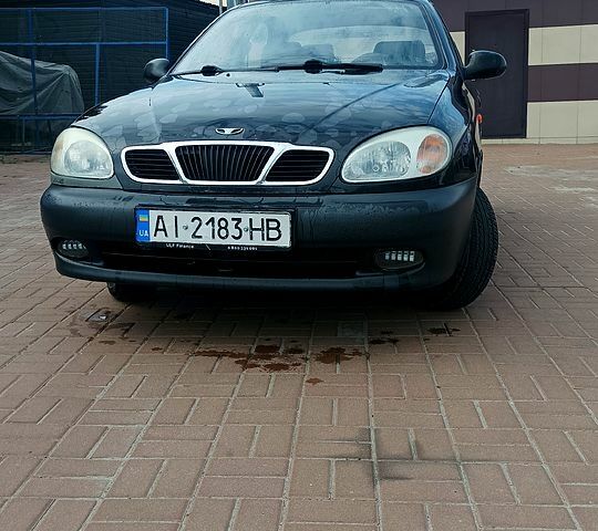 Черный Дэу Ланос, объемом двигателя 1.5 л и пробегом 194 тыс. км за 2000 $, фото 1 на Automoto.ua