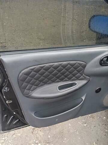 Чорний Деу Ланос, об'ємом двигуна 1.5 л та пробігом 190 тис. км за 2500 $, фото 6 на Automoto.ua