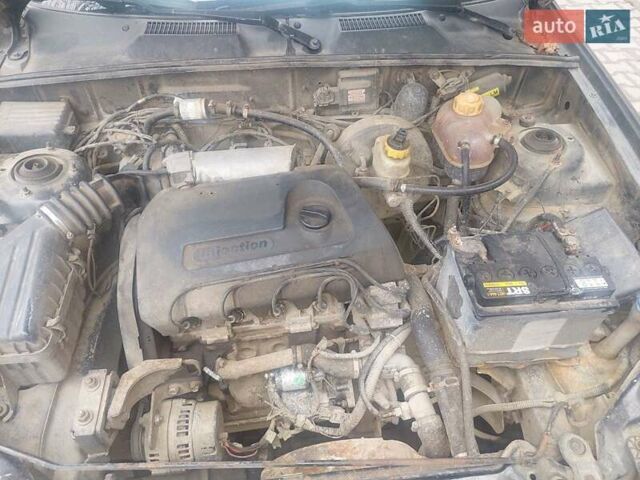 Чорний Деу Ланос, об'ємом двигуна 1.39 л та пробігом 320 тис. км за 1500 $, фото 3 на Automoto.ua