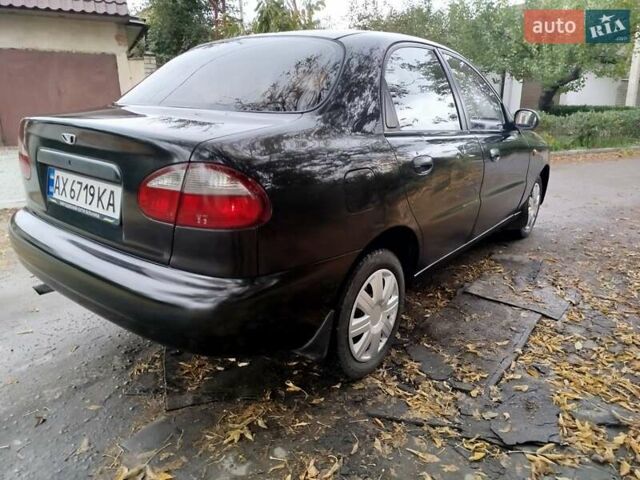 Черный Дэу Ланос, объемом двигателя 1.5 л и пробегом 350 тыс. км за 2000 $, фото 2 на Automoto.ua