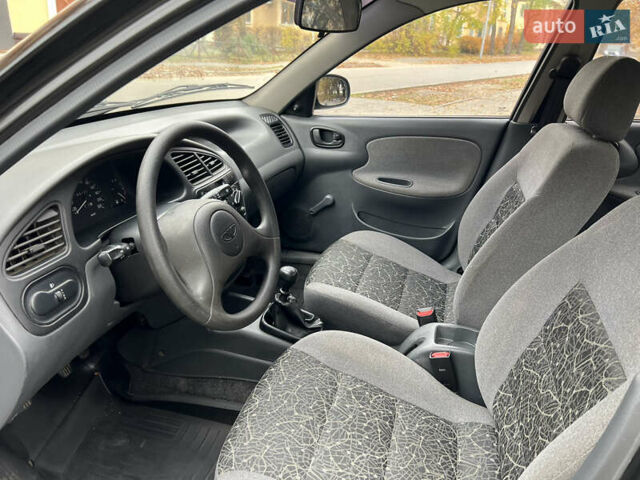 Чорний Деу Ланос, об'ємом двигуна 1.4 л та пробігом 89 тис. км за 2999 $, фото 16 на Automoto.ua