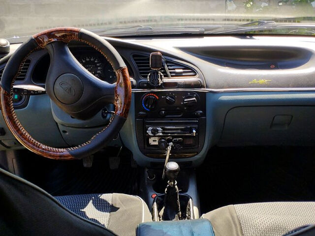 Черный Дэу Ланос, объемом двигателя 1.5 л и пробегом 240 тыс. км за 3300 $, фото 3 на Automoto.ua