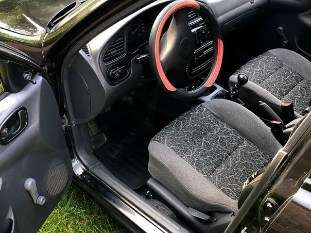 Чорний Деу Ланос, об'ємом двигуна 1.5 л та пробігом 162 тис. км за 2800 $, фото 9 на Automoto.ua