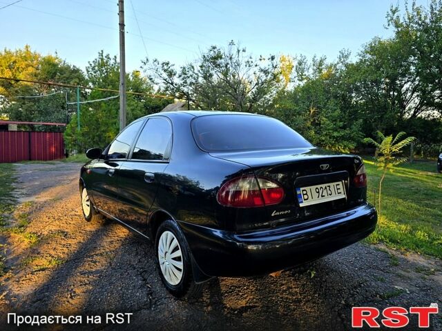 Черный Дэу Ланос, объемом двигателя 1.5 л и пробегом 224 тыс. км за 2250 $, фото 2 на Automoto.ua