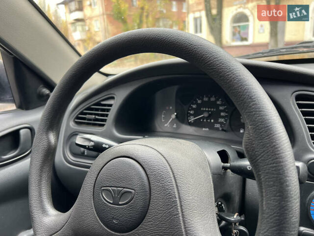 Чорний Деу Ланос, об'ємом двигуна 1.4 л та пробігом 89 тис. км за 2999 $, фото 18 на Automoto.ua