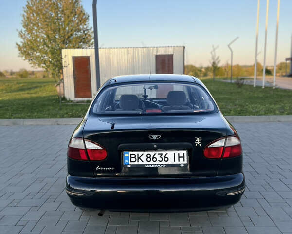 Черный Дэу Ланос, объемом двигателя 1.5 л и пробегом 162 тыс. км за 2200 $, фото 13 на Automoto.ua