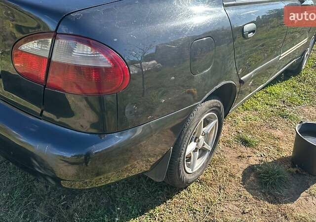 Чорний Деу Ланос, об'ємом двигуна 1.5 л та пробігом 235 тис. км за 2500 $, фото 7 на Automoto.ua