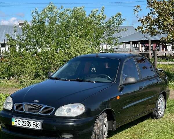 Черный Дэу Ланос, объемом двигателя 1.6 л и пробегом 100 тыс. км за 2300 $, фото 2 на Automoto.ua