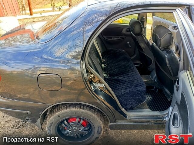 Черный Дэу Ланос, объемом двигателя 1.5 л и пробегом 280 тыс. км за 2100 $, фото 4 на Automoto.ua