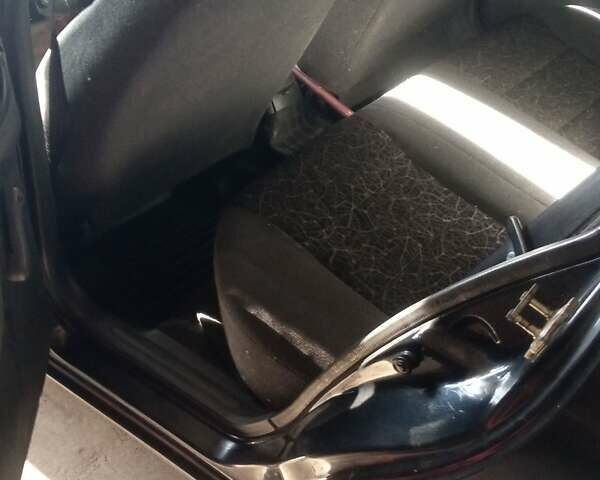 Чорний Деу Ланос, об'ємом двигуна 1.5 л та пробігом 157 тис. км за 1650 $, фото 10 на Automoto.ua