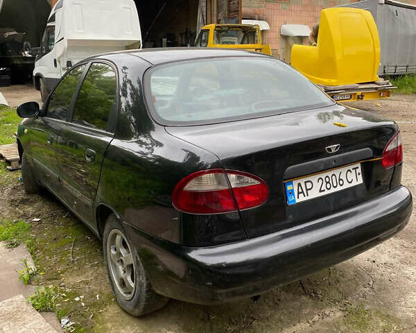Черный Дэу Ланос, объемом двигателя 0 л и пробегом 250 тыс. км за 2000 $, фото 4 на Automoto.ua