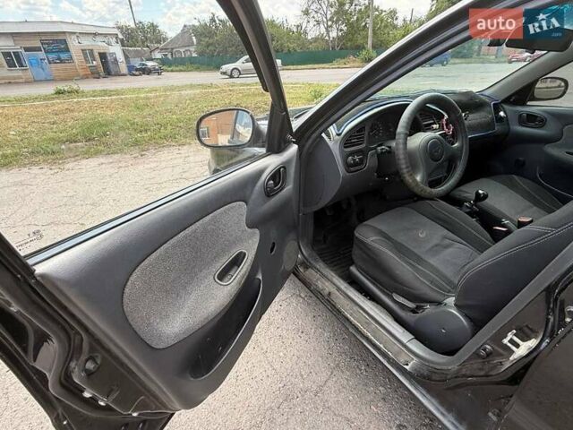 Дэу Ланос 2008 в Полтаве на Automoto.ua Черный Дэу Ланос, объемом двигателя 1.5 л и пробегом 245 тыс. км за 2400 $, фото 4 на Automoto.ua