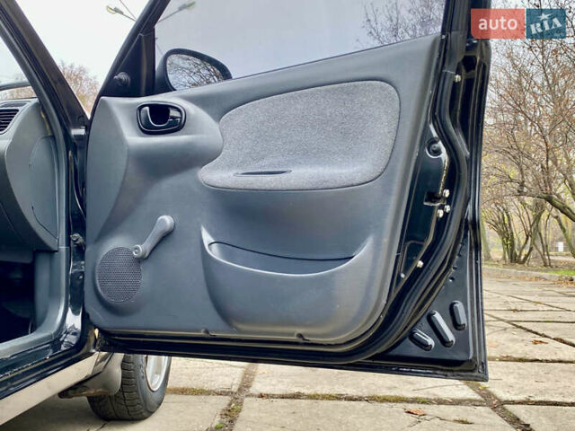 Черный Дэу Ланос, объемом двигателя 1.5 л и пробегом 198 тыс. км за 2500 $, фото 25 на Automoto.ua