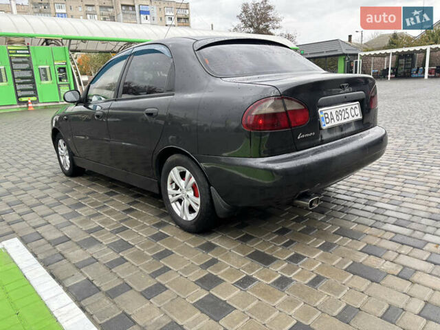 Черный Дэу Ланос, объемом двигателя 1.6 л и пробегом 270 тыс. км за 2900 $, фото 11 на Automoto.ua