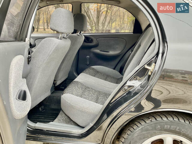 Черный Дэу Ланос, объемом двигателя 1.5 л и пробегом 198 тыс. км за 2600 $, фото 20 на Automoto.ua