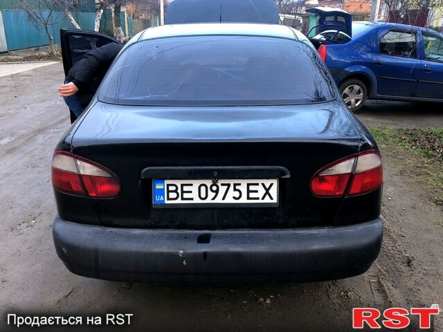 Чорний Деу Ланос, об'ємом двигуна 1.5 л та пробігом 198 тис. км за 1700 $, фото 4 на Automoto.ua