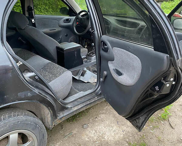 Черный Дэу Ланос, объемом двигателя 0 л и пробегом 250 тыс. км за 2000 $, фото 8 на Automoto.ua