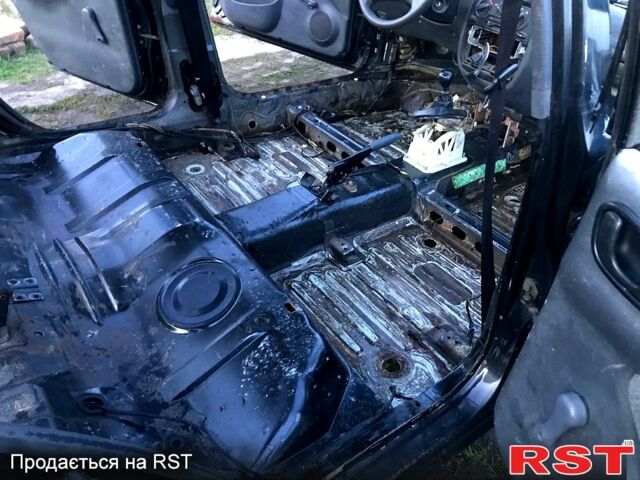Черный Дэу Ланос, объемом двигателя 1.5 л и пробегом 368 тыс. км за 1150 $, фото 8 на Automoto.ua
